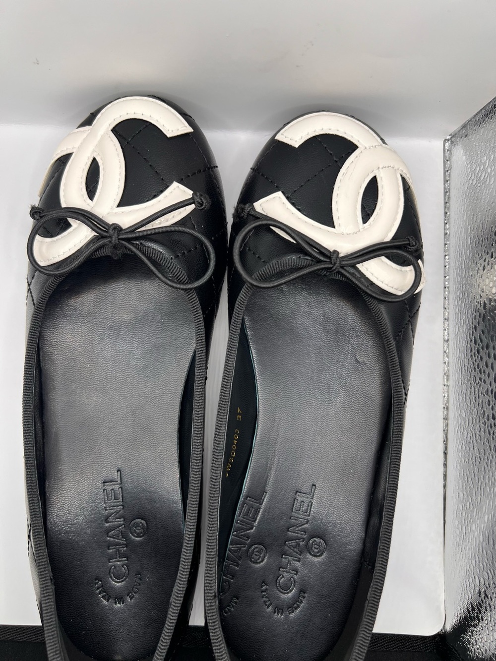 CHANEL Black Leather Ballet Flats with White CC Appliqué